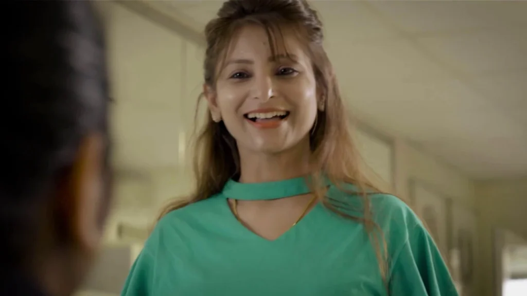 Woman speaking in a frame from the GEMS Winchester School Dubai corporate film.