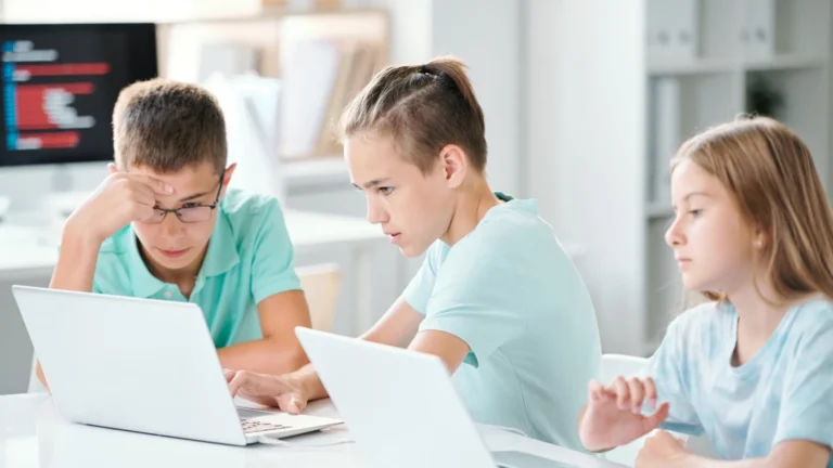 Children working together in Roots Prep School's published aftercare article cover